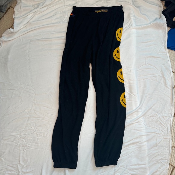 Aviator Nation Black Track Pants with Yellow Smiley Faces - Picture 1 of 6
